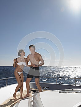 Playful Couple Enjoying On Yacht