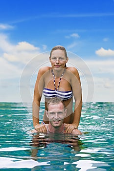 Playful couple in the water