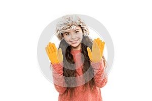 Playful fashionista. Child long hair soft fur hat enjoy softness. Soft care concept. Faux fur trend. Girl long hair wear