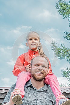 Playful father and daughter