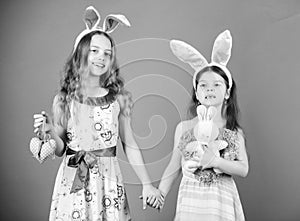 Playful girls sisters celebrate easter. Spring holiday. Happy childhood. Easter day. Easter activities for children