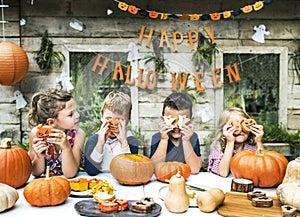 Playful kids enjoying a Halloween party