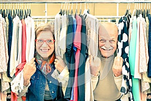 Playful senior couple at weakly flea market