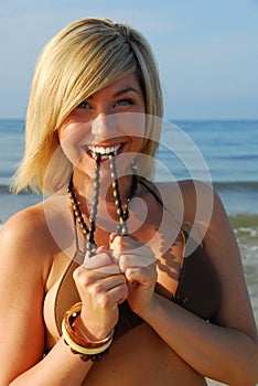 Playful woman at beach