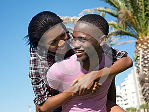 Playful young couple laughing together