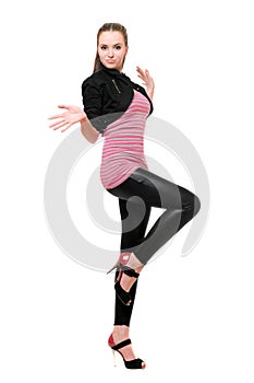 Playful young woman in black leggings