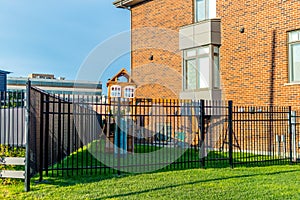 Playground in the backyard behind the luxury house