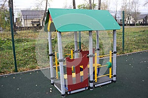 Playground of children`s near a house .