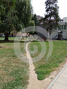 Playground for children with seesaws, slides andswings