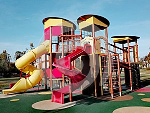 Playground with climbing frame, ladder, tube, slides in a park in Szekesfehervar, Hungary