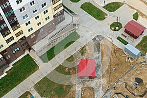 Playground and Parking near a residential multi-storey building. Top view of the courtyard. A large residential area with