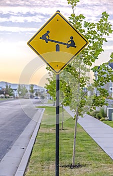 Playground sign on a sunny street in Daybreak Utah