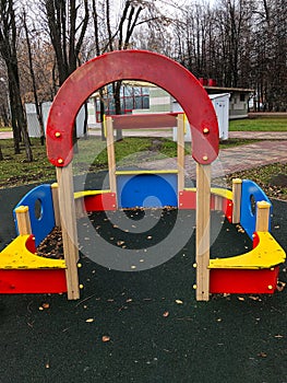 Playground, slides, swings, a ladder in city park
