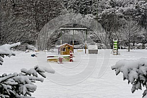 Playground with snowy toys
