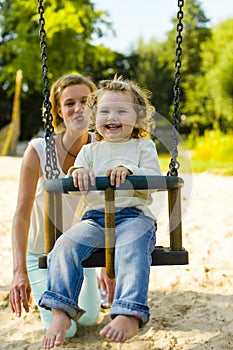 On the playground, swing