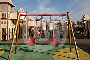 Playground swings in castle