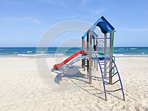 Playhouse for kids on the sand near the sea