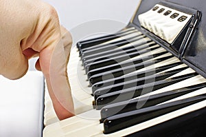 Playing on accordion keyboard