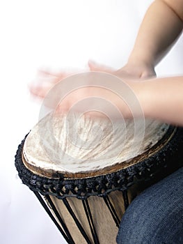 Playing african handdrum