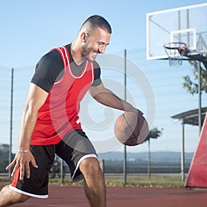 Playing basketball outdoors