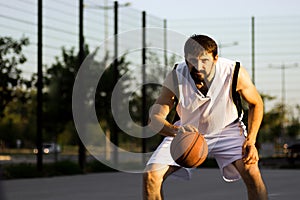 Playing basketball player