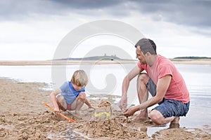 Playing on the beach with dad