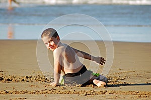 Playing in beach sand