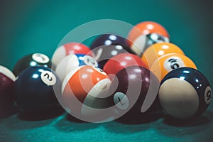 playing biliard in a pool.