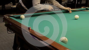 Playing billiard. shot of a man playing billiard