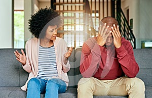 Playing the blame game. a young couple having relationship problems at home.