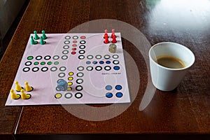 playing board ludo and coffee