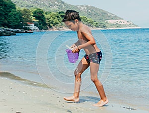 Playing with bucket of water
