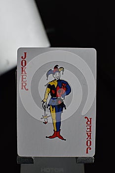 Playing card joker isolated blur background