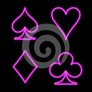 Playing card symbol pink neon sign on black whiteground