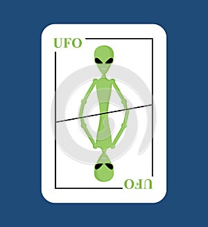 Playing card UFO. Conceptual new card alien. Green space invader