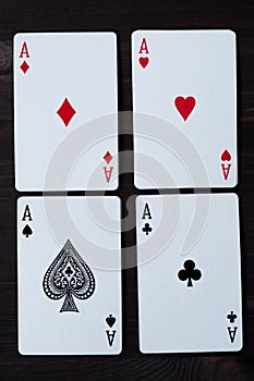 Playing cards on black background. Royal flush