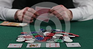 Playing cards in a casino  raising bets with chips. Success and victory. Poker  blackjack  Texas poker. Las Vegas . All in Betting