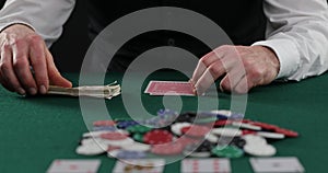 Playing cards in a casino raising bets with chips. Success and victory. Poker blackjack Texas poker. Las Vegas. All in Betting