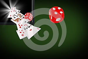 Playing cards and dice flying at the laptop. online card games concept