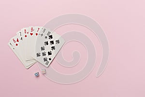 Playing cards and dices on color background. Gambling concept. Top view