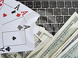 Playing cards, dollars background, keyboard, opportunity