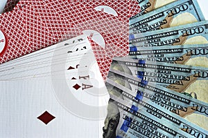 Playing cards and dollars
