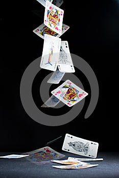 Playing cards falling