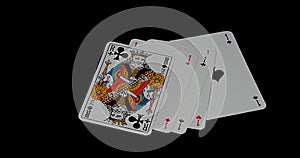 Playing Cards, Four Aces and One King falling againt Black Background