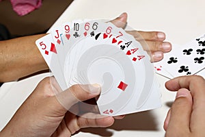 Playing cards in hand