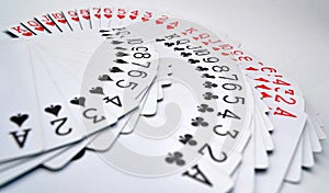 Playing cards of hearts, diamonds, clubs, spades