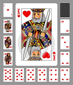 Playing cards of Hearts suit and back on green background