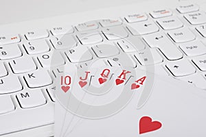 Playing cards lying on computer keyboard