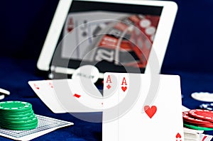 Playing cards reflected in computer screen