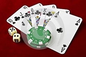 Playing cards (Royal flush), casino chips and dices